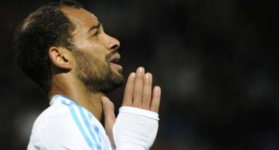 Marseille's Tunisian forward Saber Khalifa reacts after missing a goal during the French L1 football match Olympique of Marseille OM versus Nantes at the Velodrome stadium in Marseille, southern France, on December 6, 2013.  By Boris Horvat AFPFile