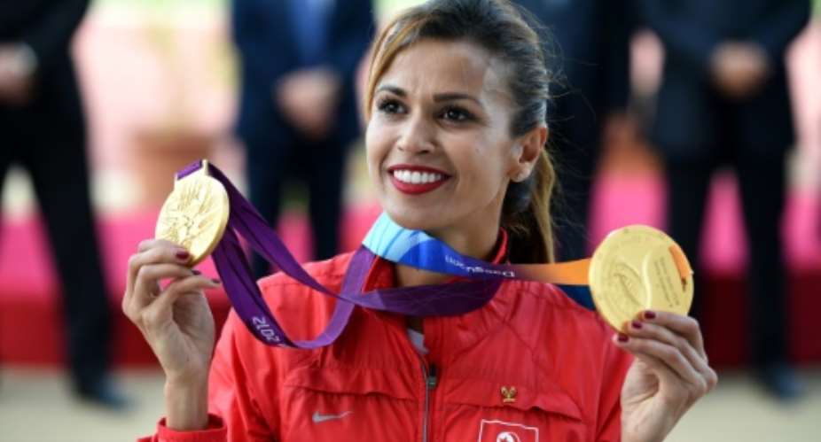 Tunisian 3000m steeplechase competitor Habiba Ghribi was awarded the gold medal for the World Cup 2011 and Olympics 2012 on June 4, 2016 after Russian athlete Yulia Zaripova was disqualified for doping.  By Fethi Belaid (AFP)
