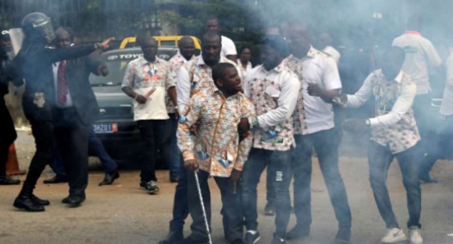 GPS members clashed with police outside party headquarters on Monday.  By SIA KAMBOU AFP