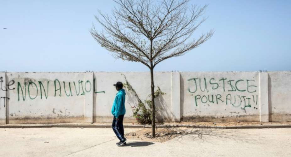 Grafitti in Senegal's Dakar reads Justice for Adji, referring to the woman who has accused the opposition leader of rape.  By JOHN WESSELS AFPFile