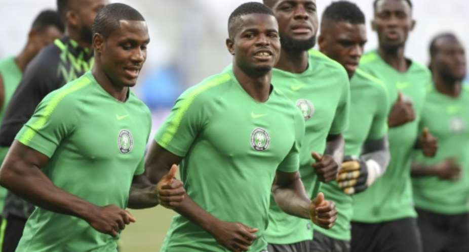 Green power: The Super Eagles train on the eve of Friday's big match.  By Mark RALSTON AFP