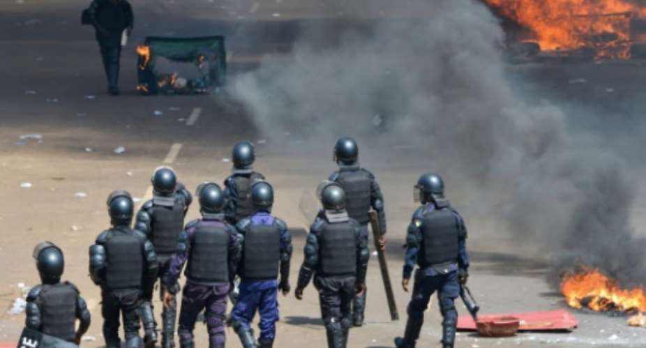 Guinea has been shaken by violence during weeks of demonstrations over opposition suspicions that President Alpha Conde is seeking a third term in office.  By CELLOU BINANI AFP