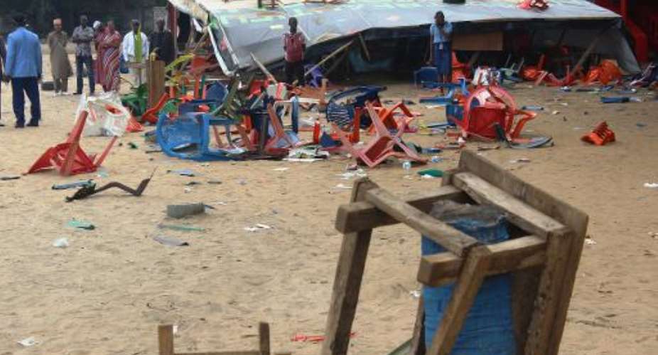 A photo taken on July 30, 2014, shows broken chairs on a beach in Conakry after a stampede at a rap concert.  By Cellou Binani AFPFile