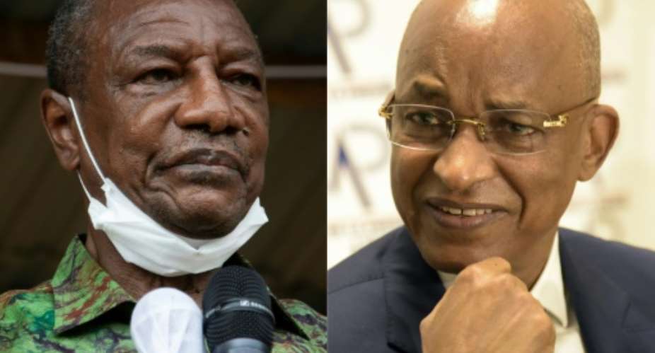 Guinea President Alpha Conde will seek to stave off a challenger from his old political opponent Cellou Dalein Diallo in Sunday's election.  By CAROL VALADE, Seyllou AFPFile