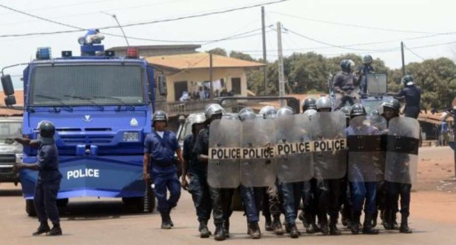 Guineas police forces prepare to disperse a demonstration in Conakry on May 2, 2013.  By Cellou Binani (AFP/File)