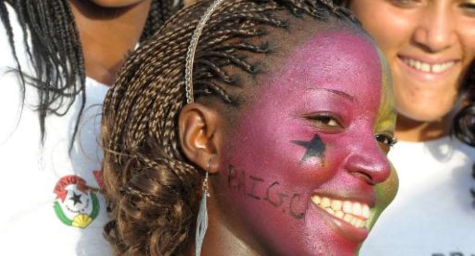 Supporters of former finance minister Jose Mario Vaz, presidential candidate of the African Party for the Independence of Guinea-Bissau and Cape Verde, attend his final campaign rally May 16, 2014 in Bissau.  By Seyllou (AFP)