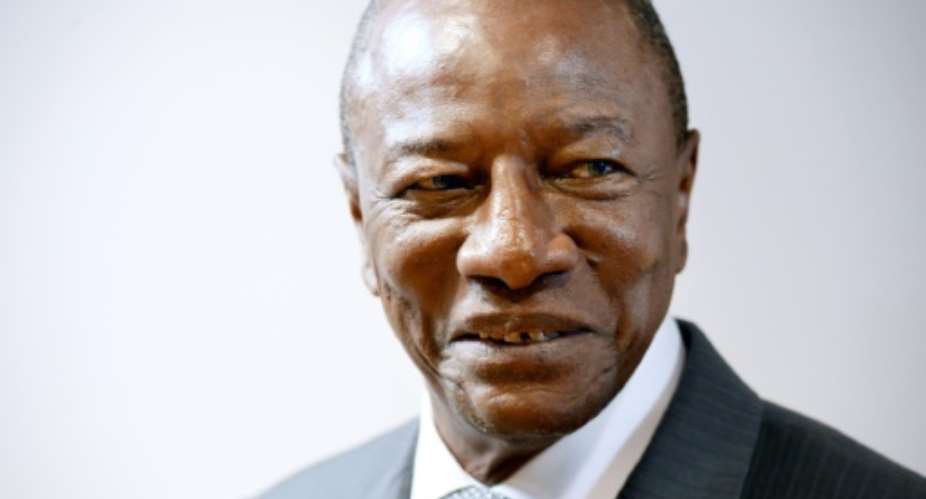 Guinean President Alpha Conde, pictured on June 7, 2017, has offered to work with Qatar and other Gulf countries in order to reach a compromise for the ongoing Gulf crisis.  By THIERRY CHARLIER AFPFile