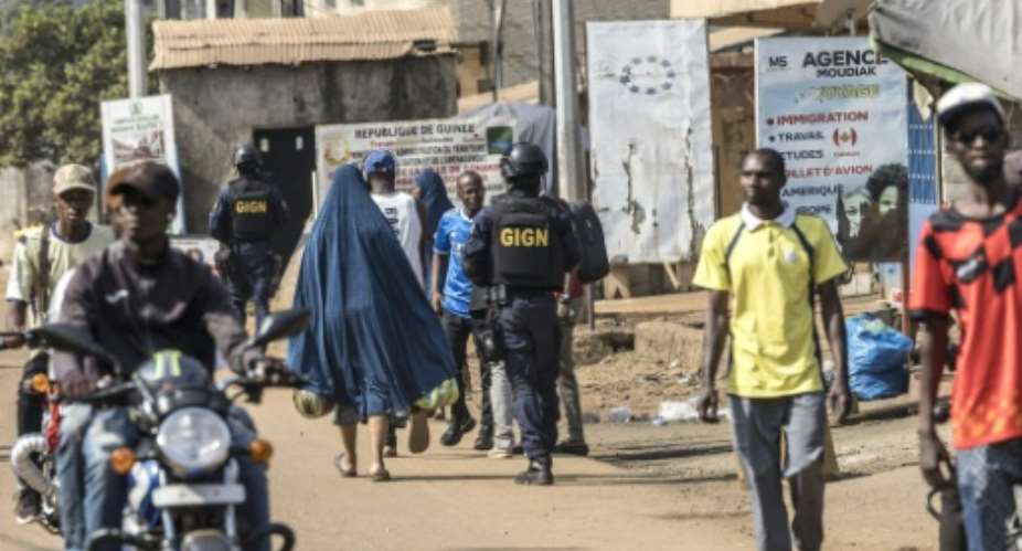 Guineans vote on Sunday for a president but the main opposition leaders have been barred.  By PATRICK MEINHARDT (AFP)