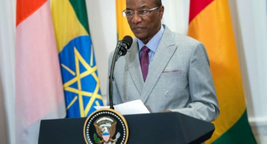 Guinea's President Alpha Conde, President of the African Union,demanded an enquiry and prosecutions relating to what he termed a despicable trade... from another era.  By Brendan Smialowski AFPFile