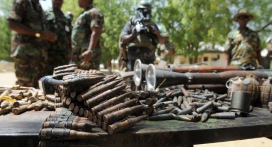 Arms and ammunitions recovered from Islamist insurgent during a clash with soldiers in Borno State, April 30, 2013.  By Pius Utomi Ekpei AFPFile