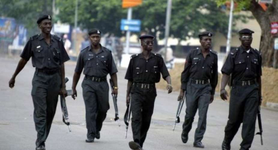 Policemen patrol in the street of Kano in 2004.  By Pius Utomi Ekpei (AFP/File)