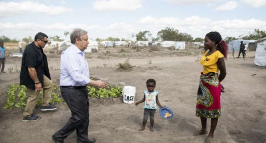 Guterres met people living at a resettlement camp in cyclone-hit central Mozambique.  By WIKUS DE WET AFP