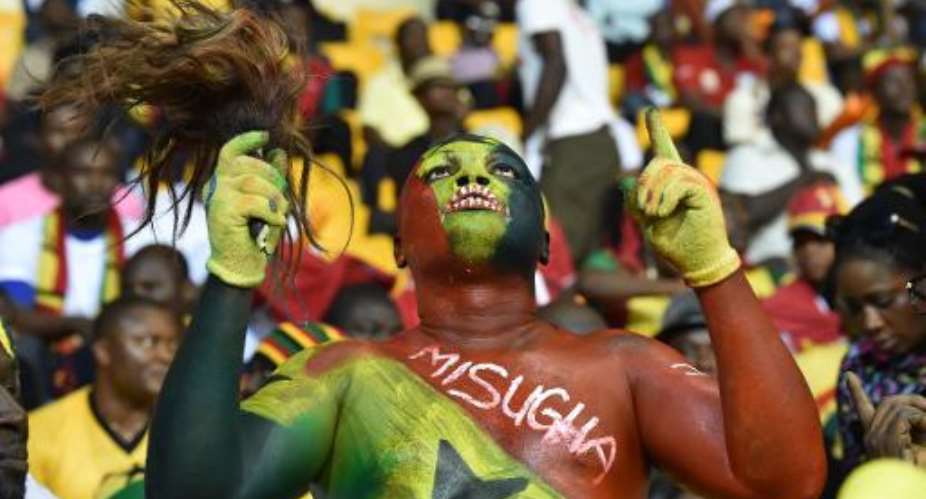 Ghana supporters cheer ahead of the 2015 African Cup of Nations semi-final football match between Equatorial Guinea and Ghana in Malabo, on February 5, 2015.  By Issouf Sanogo AFP