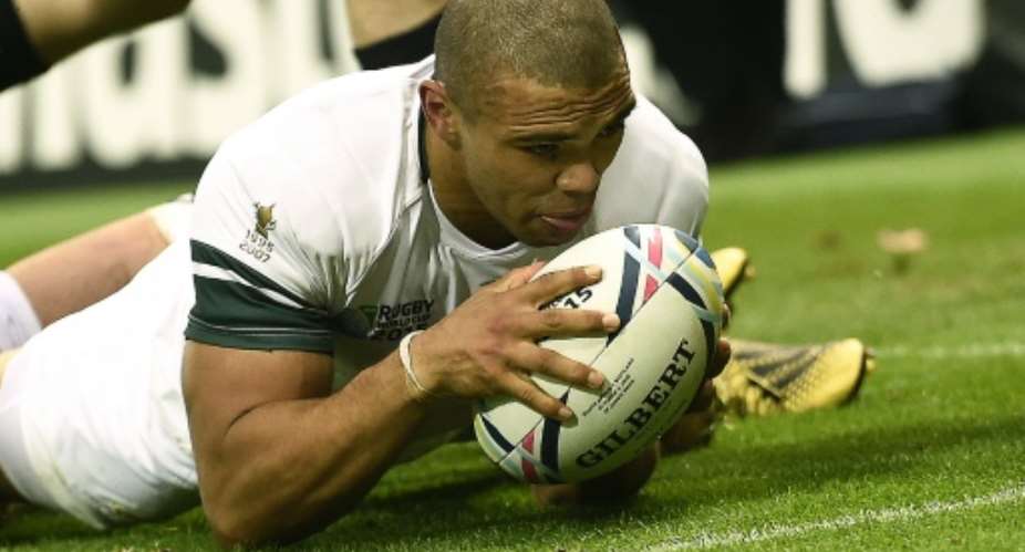 South African wing Bryan Habana scores a try during the Rugby World Cup Pool B match against Scotland at St James' Park on October 3, 2015.  By Lionel Bonaventure AFPFile