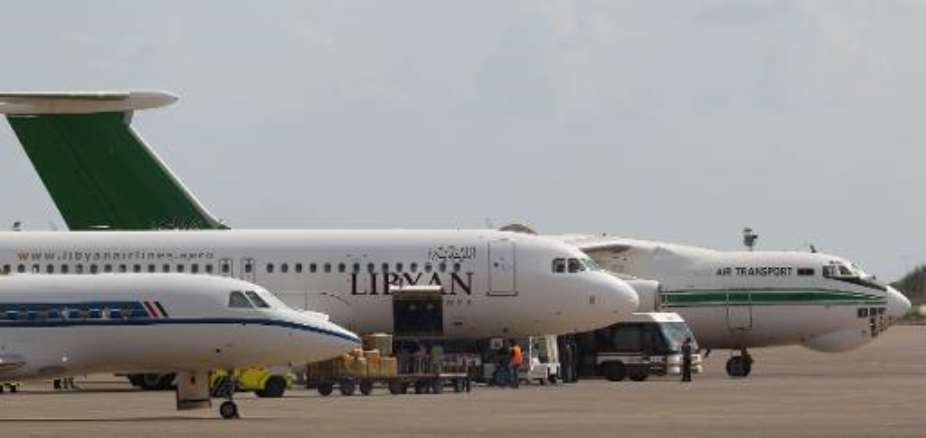 Libyan passenger aircrafts sit on the tarmac of Tripoli's Mitiga airport on September 30, 2011.  By Karim Sahib AFPFile