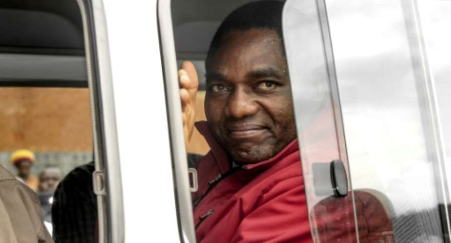 Hakainde Hichilema, seen here leaving court in Lusaka on April 18, 2017, told the magistrate he was attacked and tear-gassed by police when he was arrested on April 11.  By Dawood SALIM AFPFile