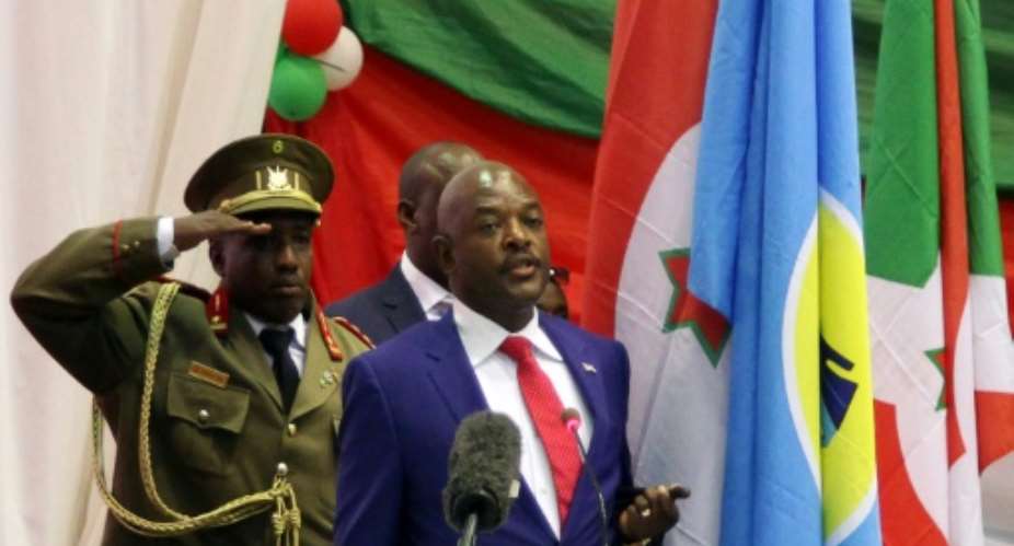 Burundi's President Pierre Nkurunziza gestures as he delivers a speech after being sworn-in for a controversial third term in power, at the Congress Palace in Bujumbura on August 20, 2015.  By Landry Nshimiye AFPFile