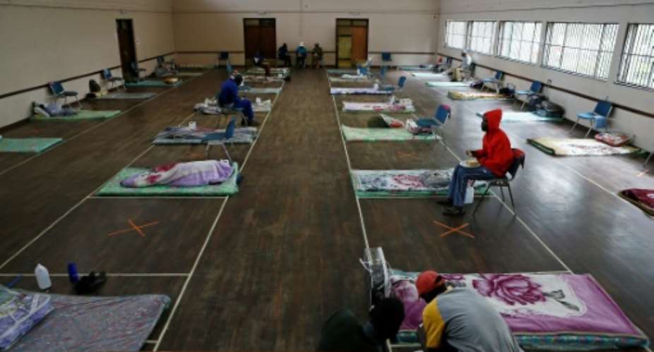 Haven: The Lyttelton Community Hall in Pretoria, one of a number of temporary shelters for the city's homeless during the coronavirus lockdown.  By Phill Magakoe AFP