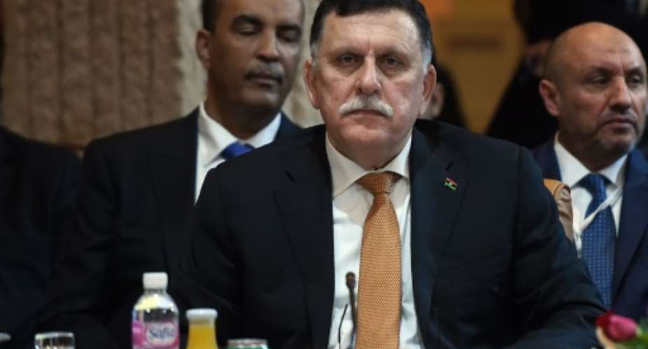 The head of Libya's UN-backed unity government, Fayez al-Sarraj, attends a meeting in Tunis on March 22, 2016.  By Fethi Belaid AFPFile