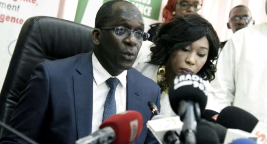 Health Minister Diouf Sarr urges Senegal's population to stay calm after the country reported its first coronavirus case.  By Seyllou AFP