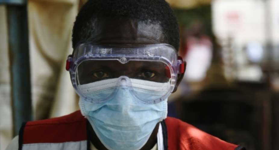 Health workers in Uganda have been carrying out checks after two fatal cases of Ebola near the border with the DR Congo.  By ISAAC KASAMANI AFP