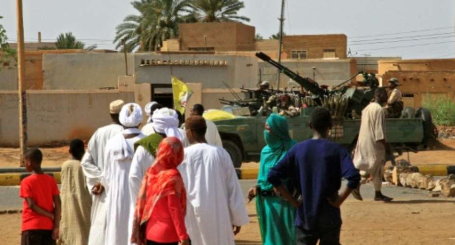 Heavily armed Sudanese security forces were out on patrol as Muslim worshippers attended Eid al-Fitr prayers.  By - AFP