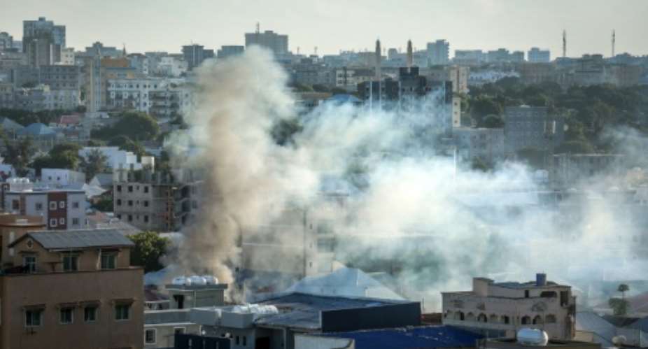 Heavy gunfire shook Somalias capital overnight and smoke rose over the city on Thursday.  By - (AFP)