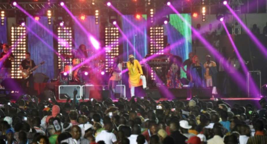 Held every two years, the Ouagadougou film festival lures stars from across Africa -- here, Ivorian singer Alpha Blondy performing at the opening ceremony in 2017.  By ISSOUF SANOGO AFPFile