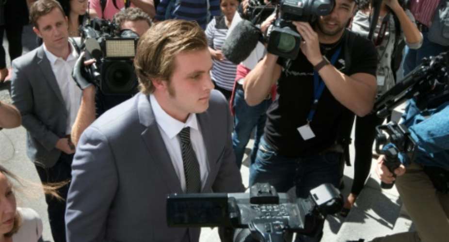 Henri van Breda C is alleged to have killed his brother and parents and left his sister struggling with nightmarish injuries in a frenzied axe attack.  By RODGER BOSCH AFPFile