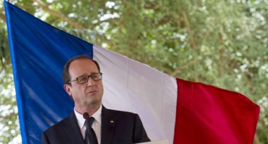 French President Francois Hollande delivers a speech during a meeting with Niger's President unseen in Niamey, on July 19, 2014.  By Alain Jocard AFP
