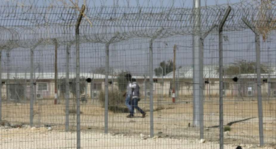 Holot detention centre is set to be shut down on April 1 as part of the Israeli government's policy to expel thousands of Eritreans and Sudanese who entered illegally.  By MENAHEM KAHANA AFP