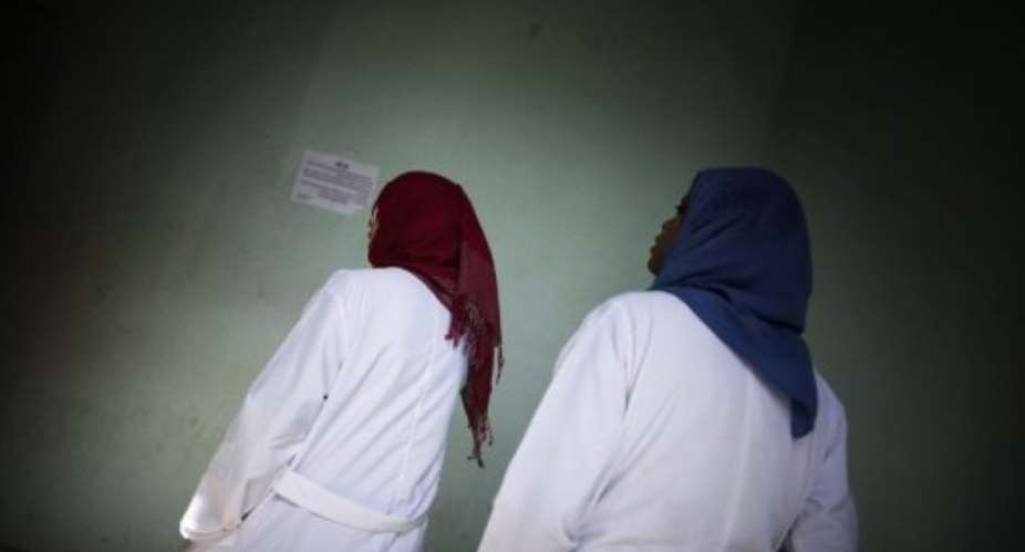 Veiled Libyan nurses are pictured at the Al-Zawiya hospital in Tripoli on October 13, 2011.  By Marco Longari AFPFile