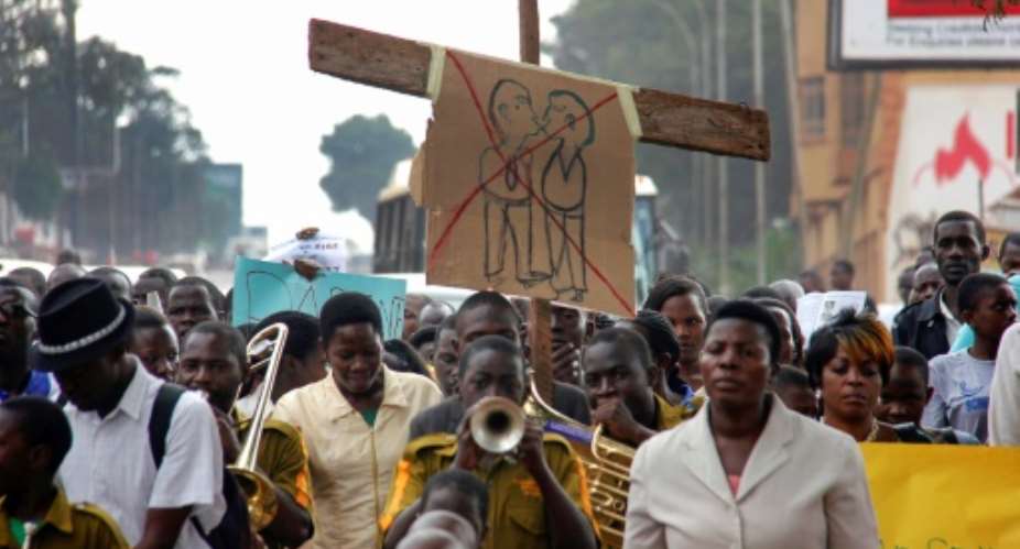 Homophobia is entrenched in many parts of Africa. In 2014, anti-gay campaigners rallied in Kampala, the Ugandan capital, after the country's Constitutional Court annulled a law toughening penalties for same-sex relations.  By ISAAC KASAMANI AFPFile