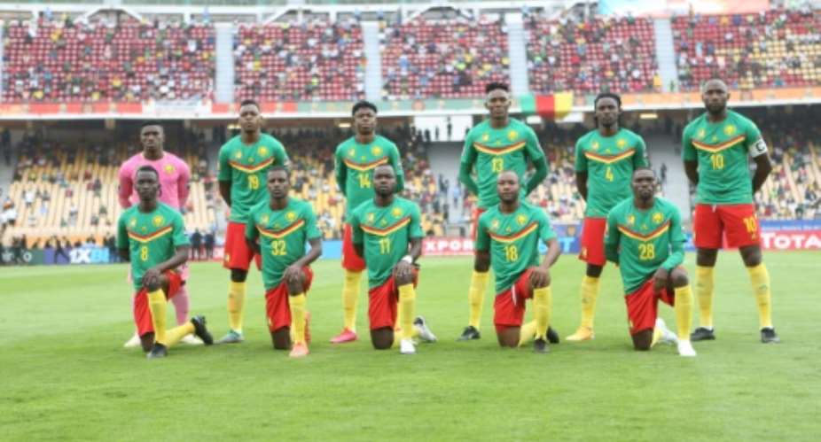 Hosts Cameroon pose before defeating Zimbabwe last Saturday in the African Nations Championship opener..  By - AFP
