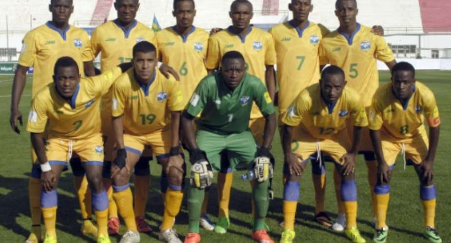 Rwanda's starting eleven pose for a picture ahead of the FIFA World Cup 2018 qualifying football match between Libya and Rwanda on November 13, 2015, at the Sousse Olympic stadium.  By Salah Lahbibi AFPFile