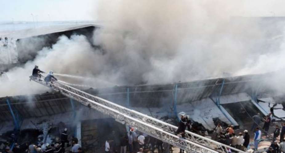 Firefighters spent several hours battling the blaze.  By Fethi Belaid AFP