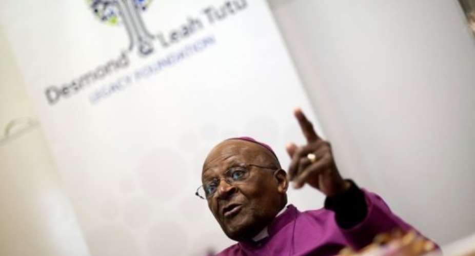 Nobel Prize Peace Laureate Archbishop Desmond Tutu speaks at a ceremony, on August 20, 2013, in Bellville, Cape Town.  By Rodger Bosch AFPFile