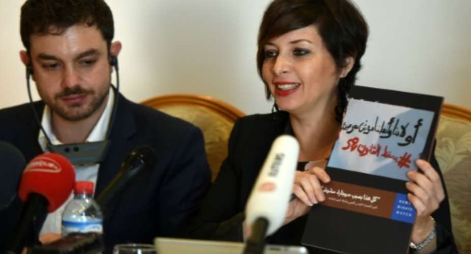 Human Rights Watch's director in Tunisia, Amna Guellali R, speaks during a press conference on February 2, 2016 in Tunis to present a 33-page document about the country's draconian drug law.  By FETHI BELAID AFPFile