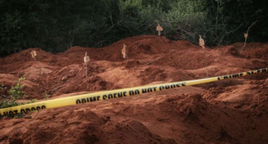 Hundreds of bodies have been exhumed from shallow mass graves discovered in April last year in a remote wilderness inland from the Indian Ocean town of Malindi.  By Yasuyoshi CHIBA AFP