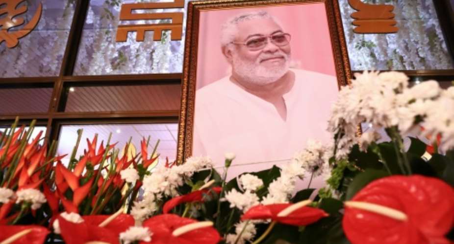 Hundreds of Ghanaians earlier this week paid their final respects as Rawlings' coffin laid in state during two days.  By Nipah Dennis AFP