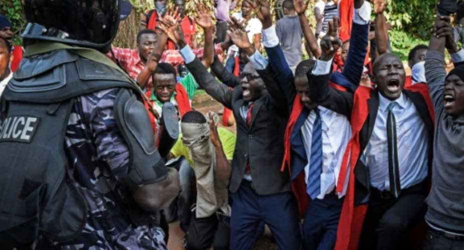 Hundreds of students at the country's main Makerere University ignored a police order to stage a protest over the proposed removal of presidential age limits.  By Isaac Kasamani AFP