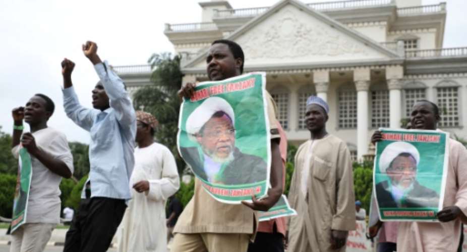 Hundreds of supporters of Shiite Muslim leader Ibrahim Zakzaky demonstrate in Abuja, on July 10, 2019, to demand his release.  By Kola SULAIMON AFPFile