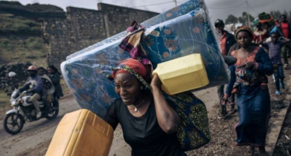 Hundreds of thousands of people have been displaced in DR Congos North Kivu province by the M23 -- an armed group that revived despite a state of siege ordered by the government.  By ALEXIS HUGUET (AFP)