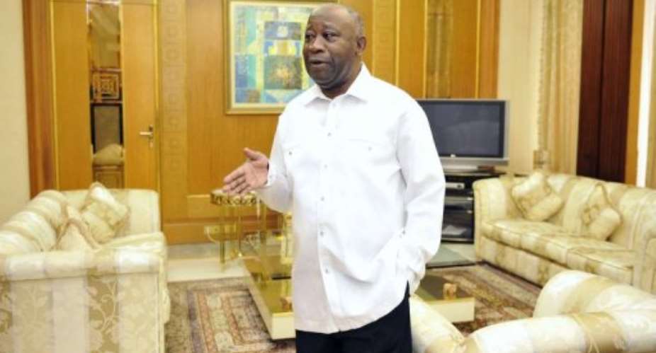 Two more people close to Ivory Coasts ex-president Laurent Gbagbo, pictured in 2011, have been charged with genocide.  By Sia Kambou (AFP/File)