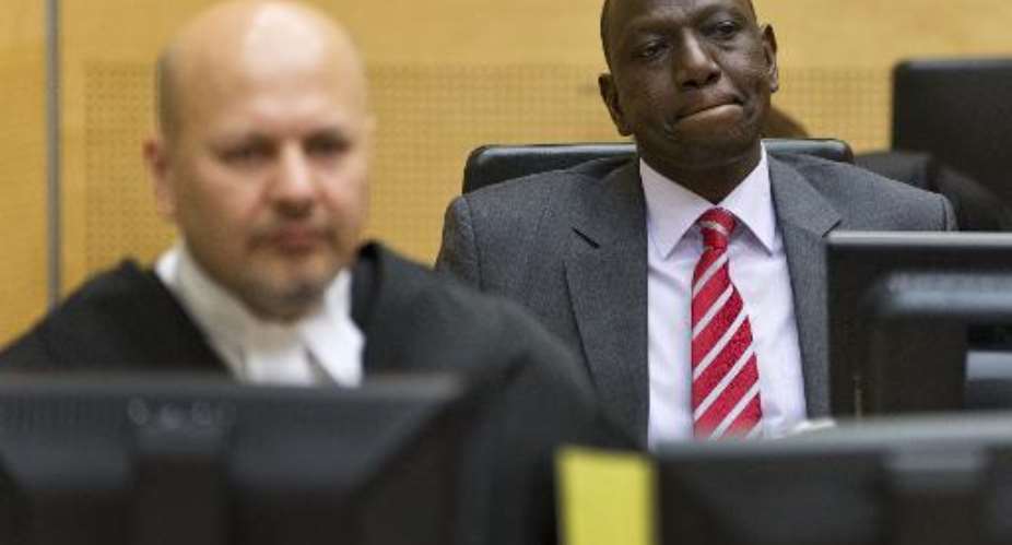 This picture taken on September 10, 2013 shows Kenya's Deputy President William Ruto  R in the courtroom at the International Criminal Court ICC in The Hague.  By Michael Kooren PoolAFPFile