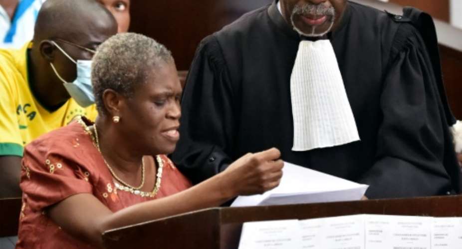 Ivory Coast's former first lady Simone Gbagbo, was sentenced in 2015 to 20 years jail over her role in 2010 post-election violence, which left more than 3,000 people dead.  By Issouf Sanogo AFPFile