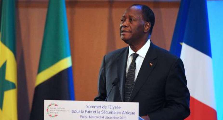 Ivory Coast's president Alassane Ouattara at the Franco-African Economic Conference in Paris on December 4, 2013.  By Eric Piermont AFPFile