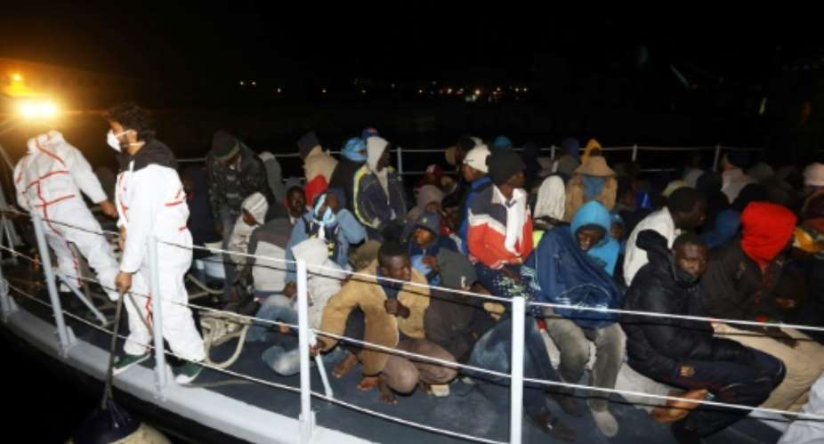 Illegal migrants from Arab and African countries arrive at a naval base in the capital Tripoli after being rescued off the coast of Zuwara.  By Mahmud TURKIA AFPFile