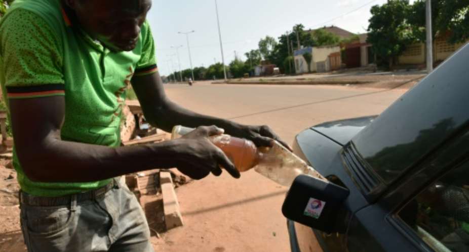 In Burkina Faso, petrol and diesel prices have shot up 12 since November 9.  By SIA KAMBOU AFPFile