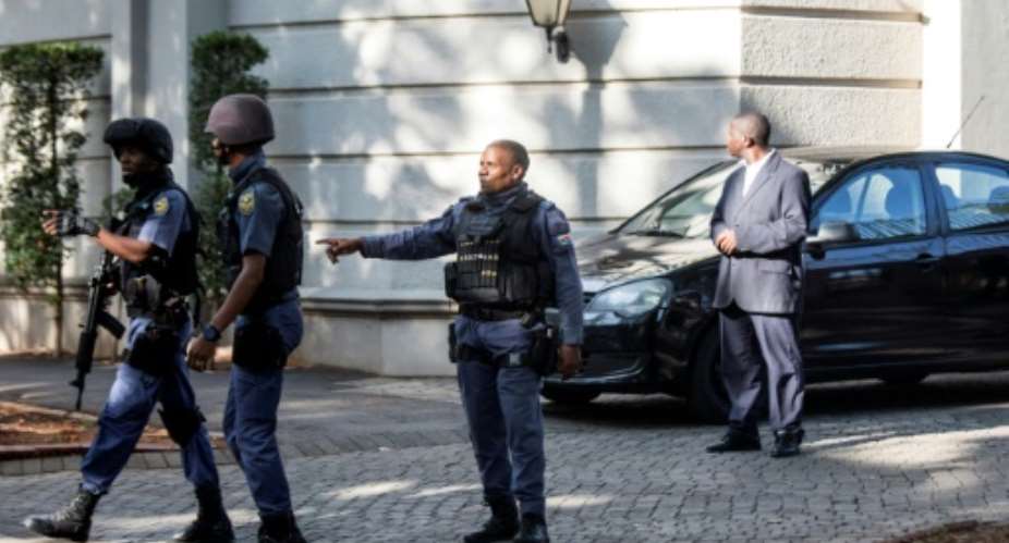 In February, South African police raided properties belonging to the Gupta family in Johannesburg as part of a graft probe.  By WIKUS DE WET AFPFile